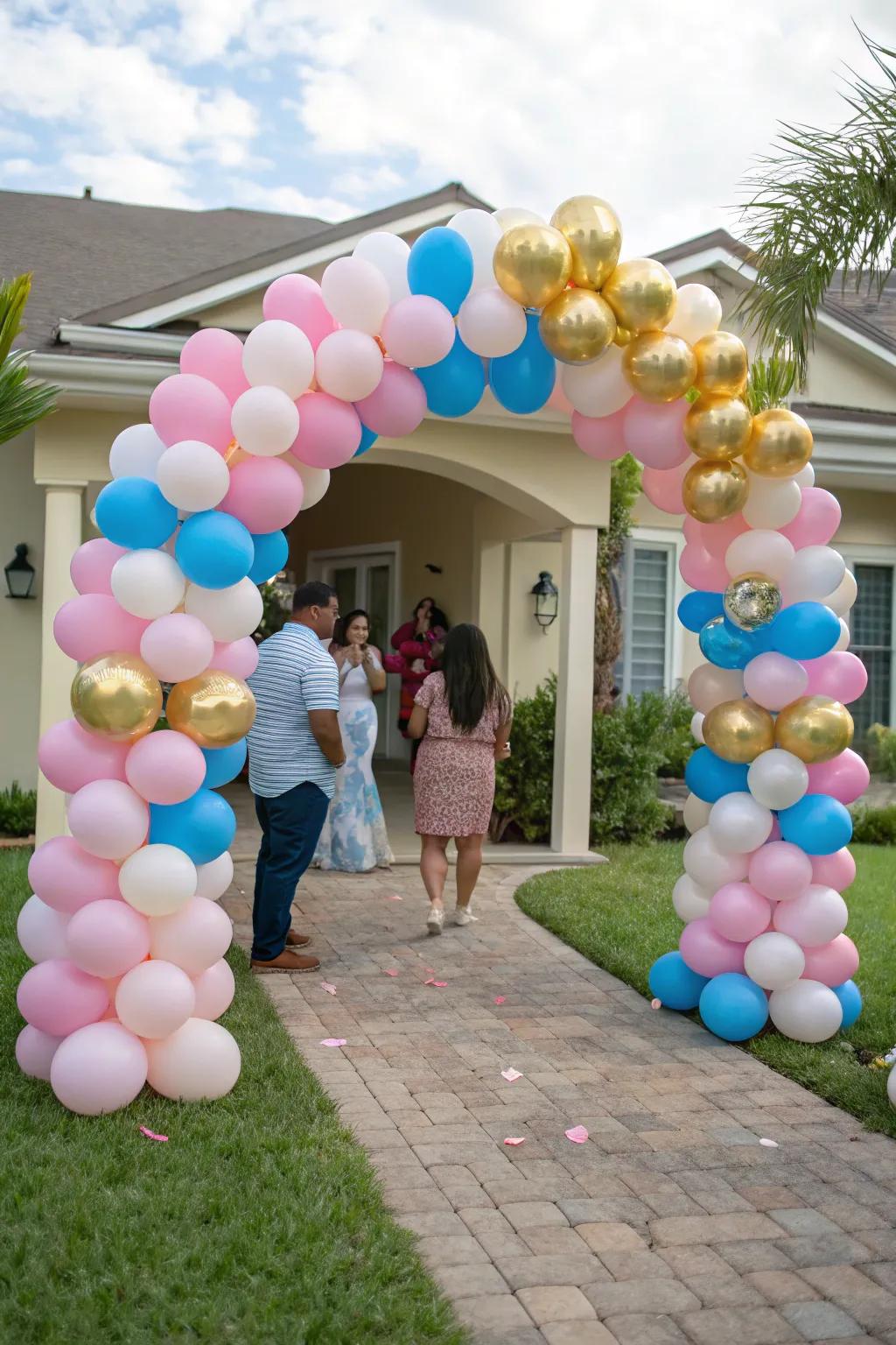 A vibrant balloon arch sets the stage for a joyful gender reveal celebration.