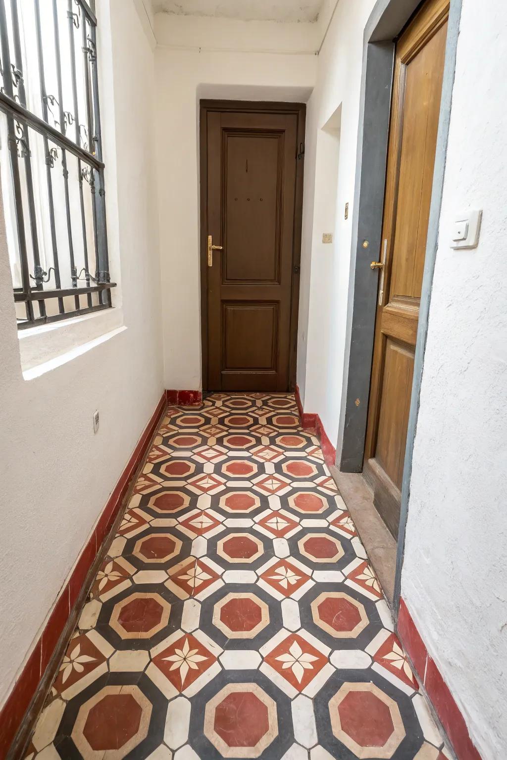 Bold Geometric Hexagon Tiles in a Small Entryway