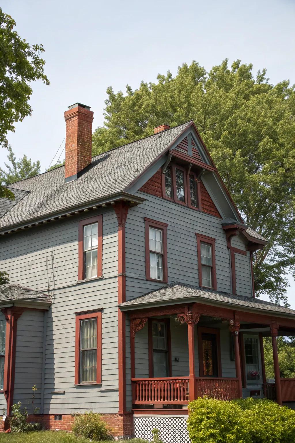 Grey siding and red brick for a timeless, classic appearance.