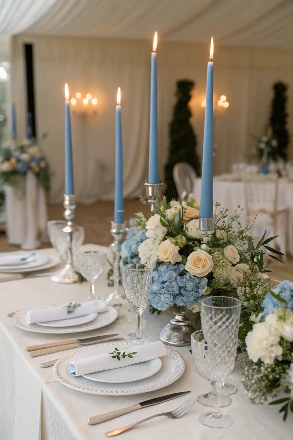 Blue tapered candles add a romantic glow to the tablescape.