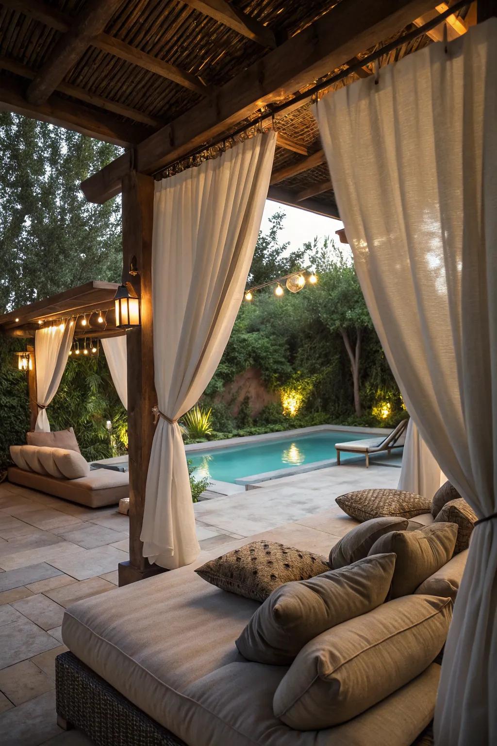 Outdoor curtains create a private, cozy nook.