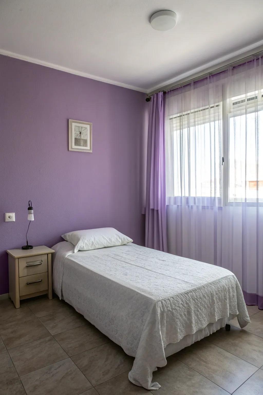 Minimalist approach allowing violet walls to shine.