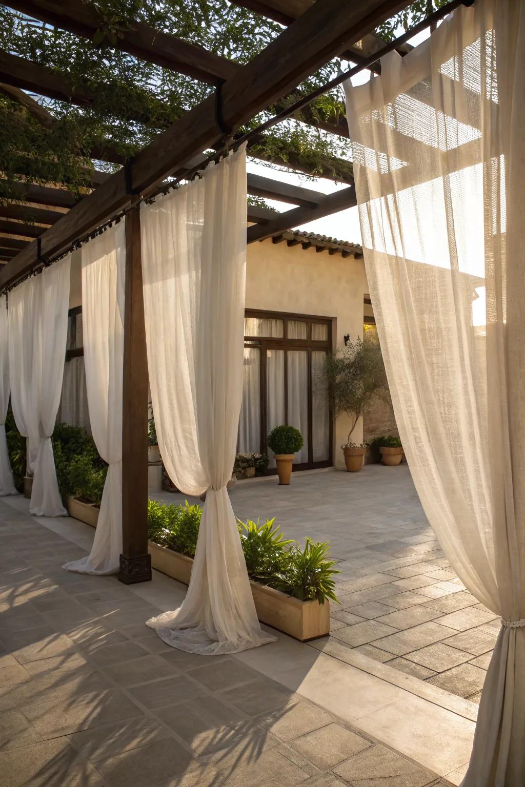 Shade curtains add elegance and privacy to the courtyard.