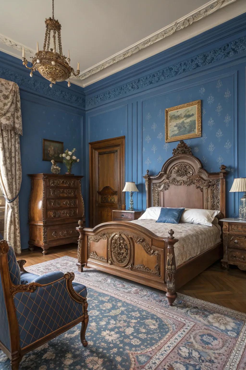 Antique furniture adds a royal charm to the modern royal blue bedroom.