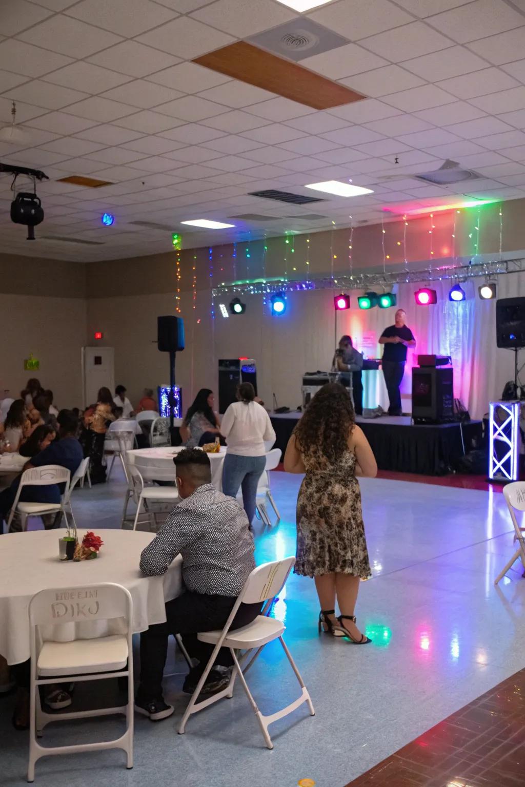 An energetic indoor party with a music and dance area.