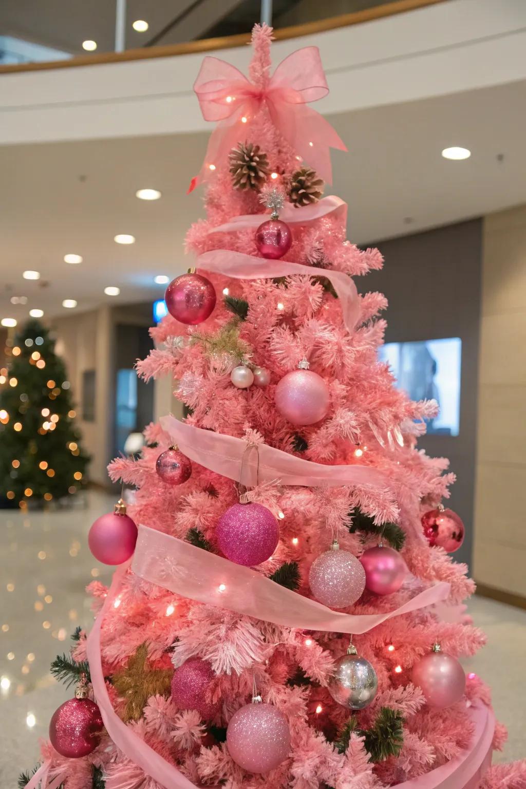 Seasonal decorations keep this pink tree fresh and versatile.