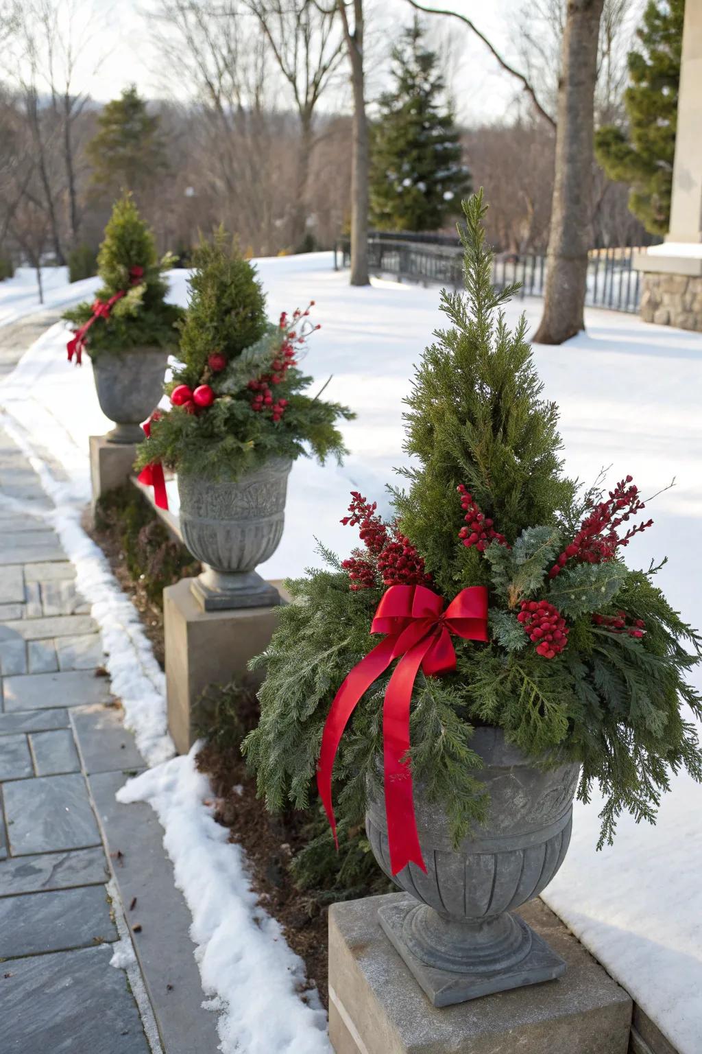 Creative planters welcome guests with holiday cheer.