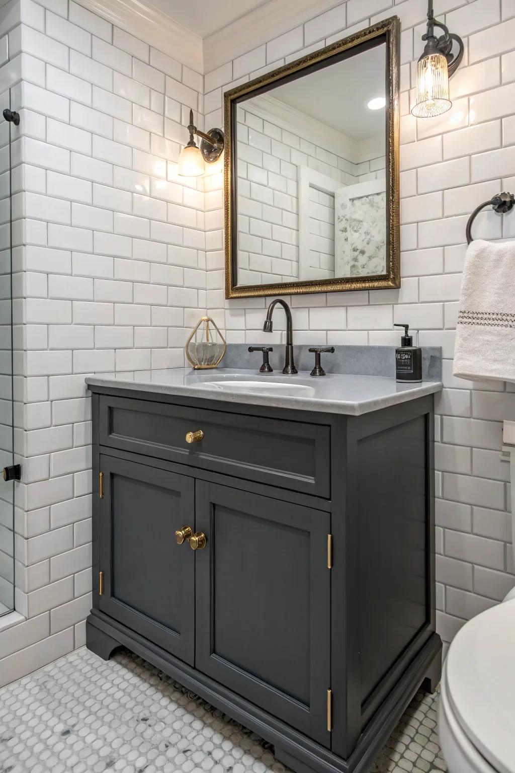 A dark gray vanity offering a dramatic contrast against white tiles.