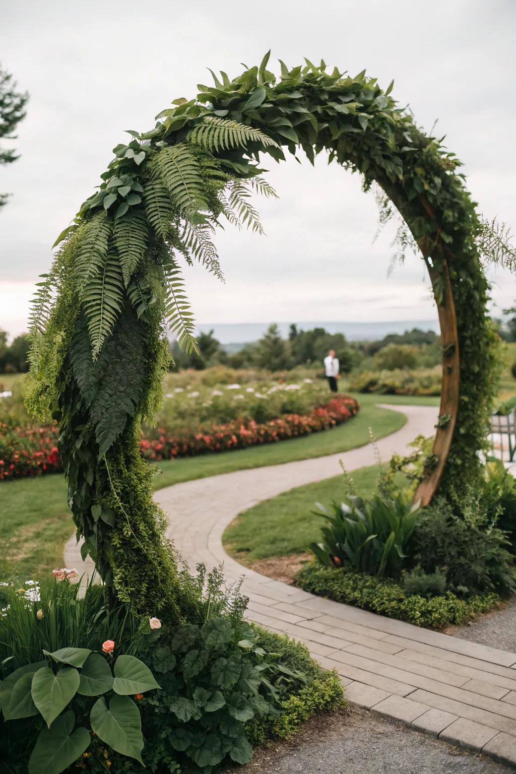 A greenery-filled round wedding arch creating a natural ambiance.