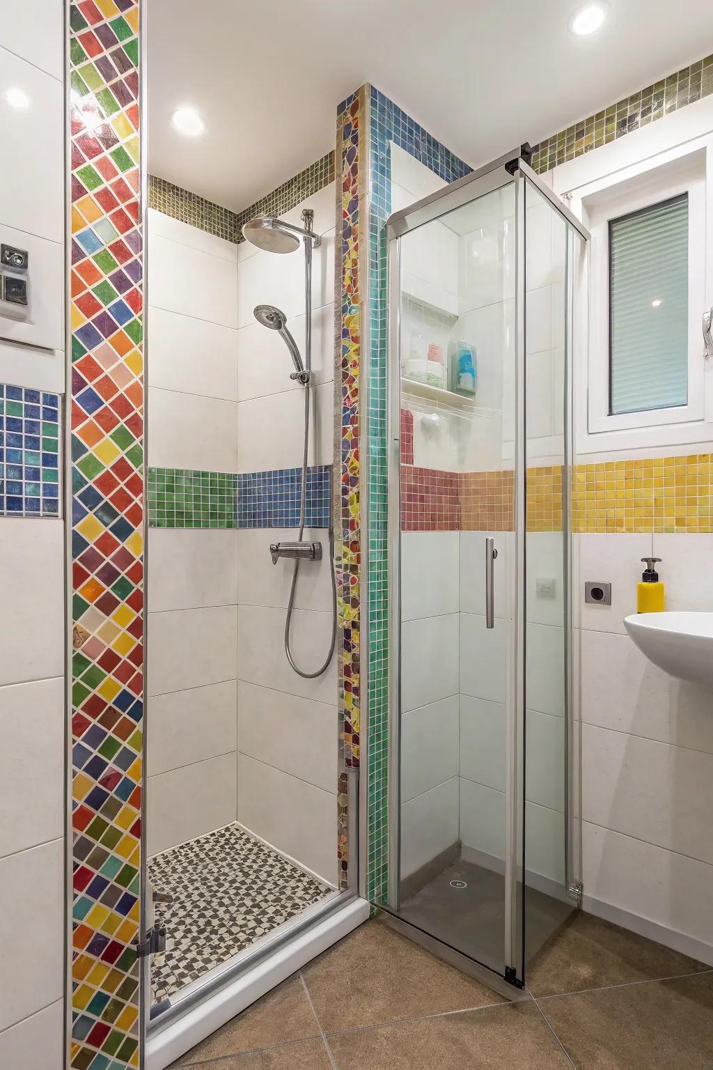 Tile patterns add personality and style to a small bathroom shower.