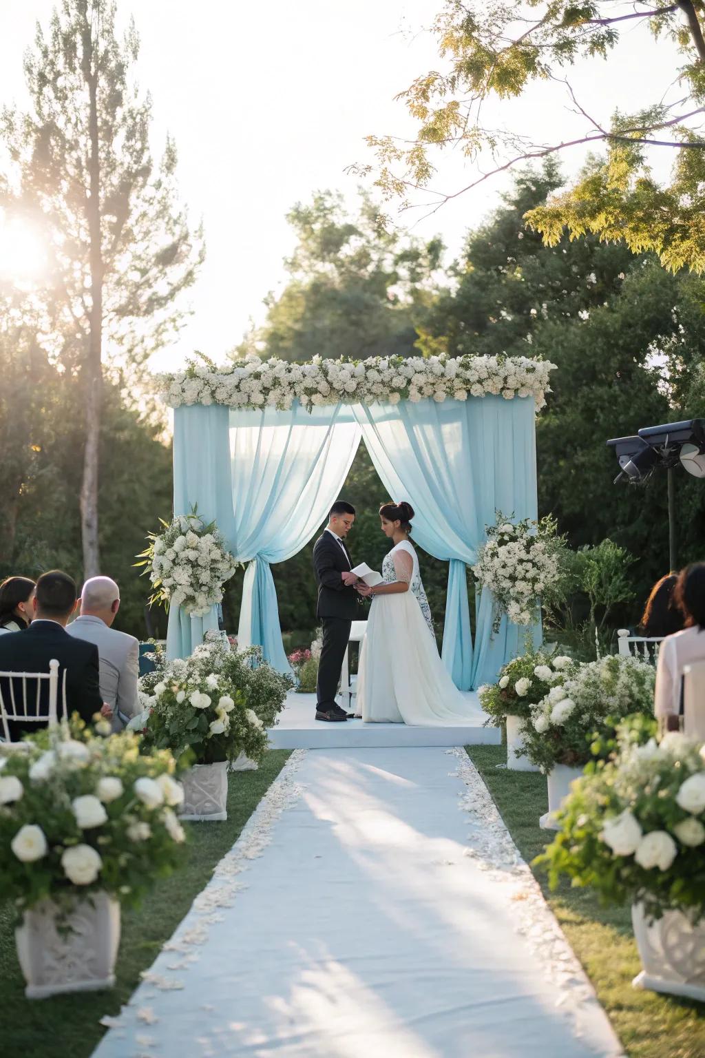 A baby blue backdrop creates a romantic setting for your vows.