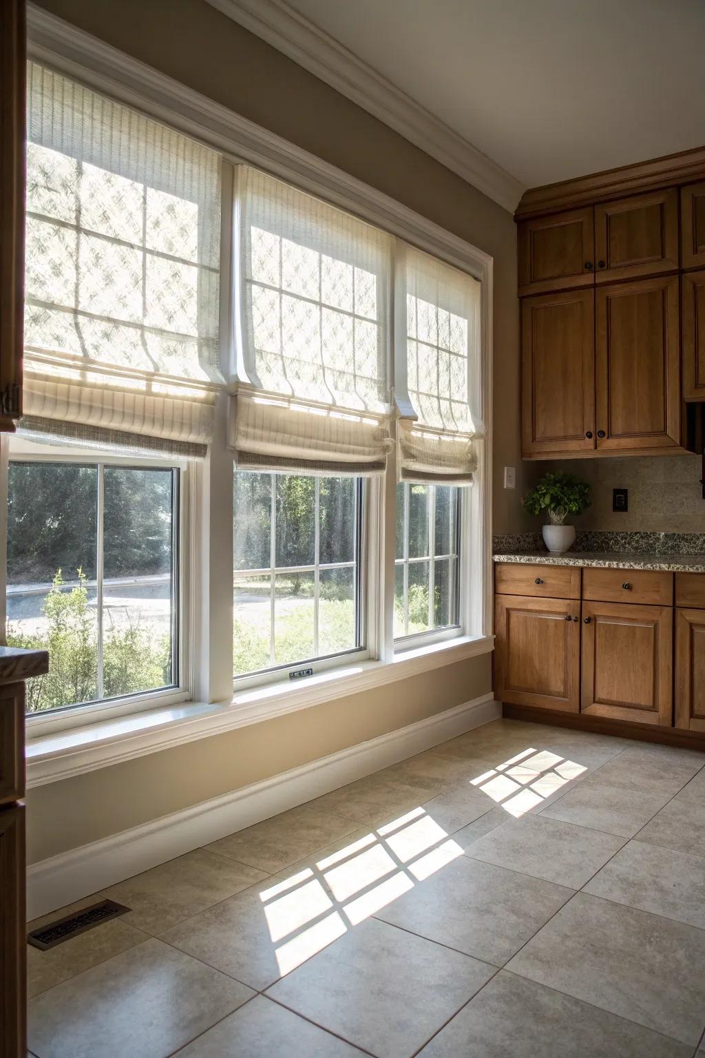 Elegant Roman shades add sophistication to the kitchen.