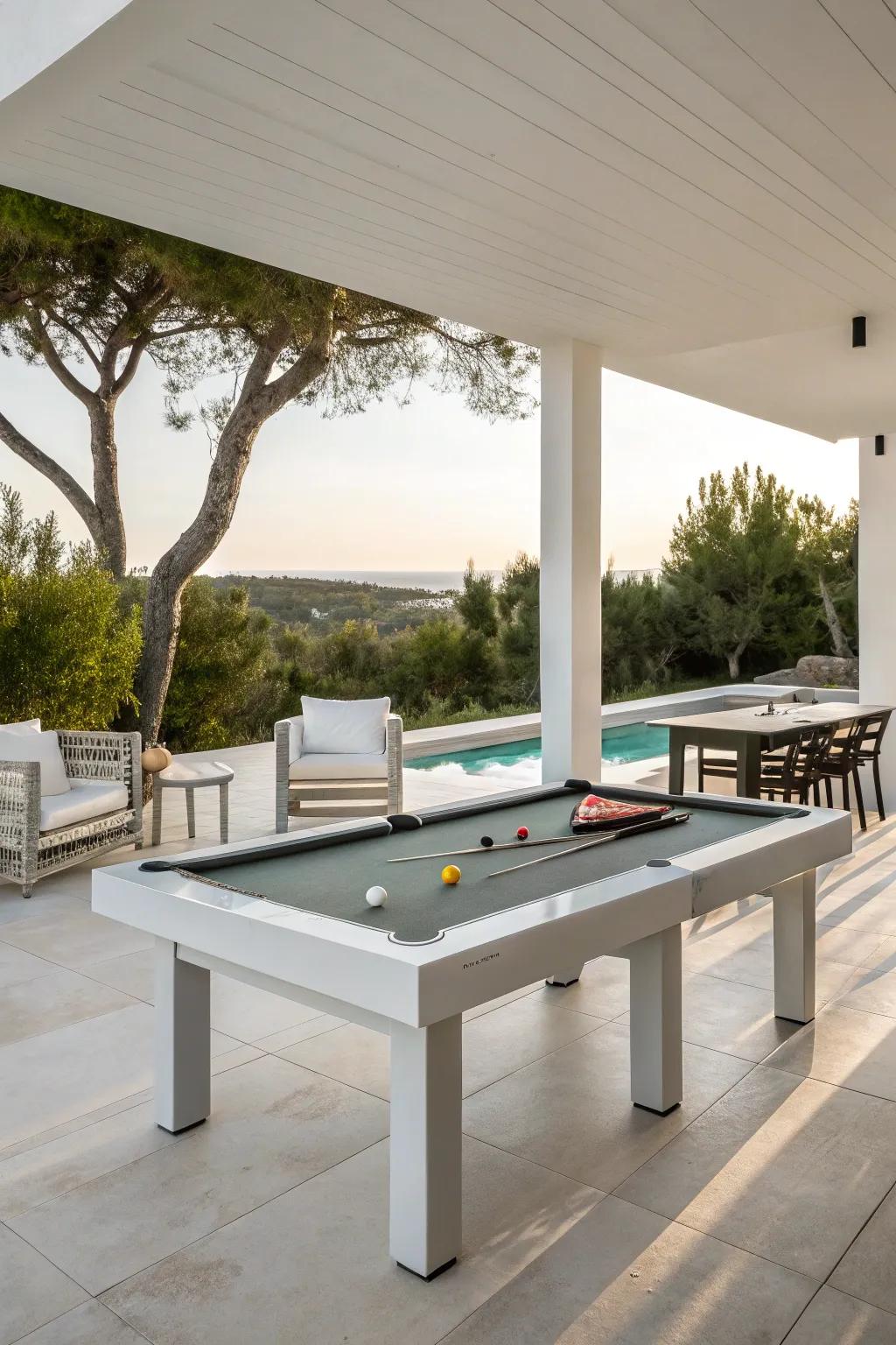 A sleek, modern outdoor pool table setup with minimalist furniture.