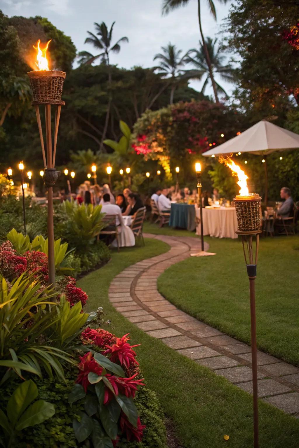 Tiki torches light up the tropical evening.