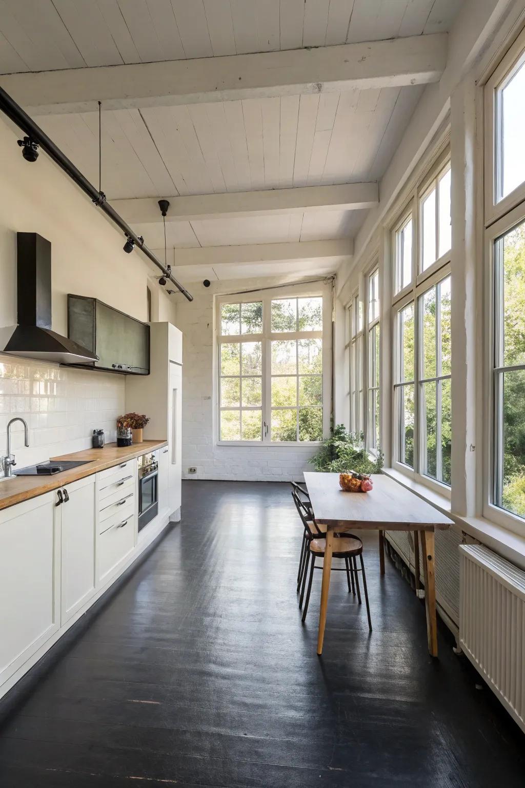 An open kitchen layout where black flooring takes center stage.