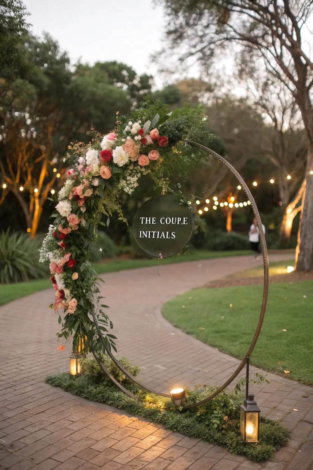 A personalized round wedding arch featuring couple's initials.