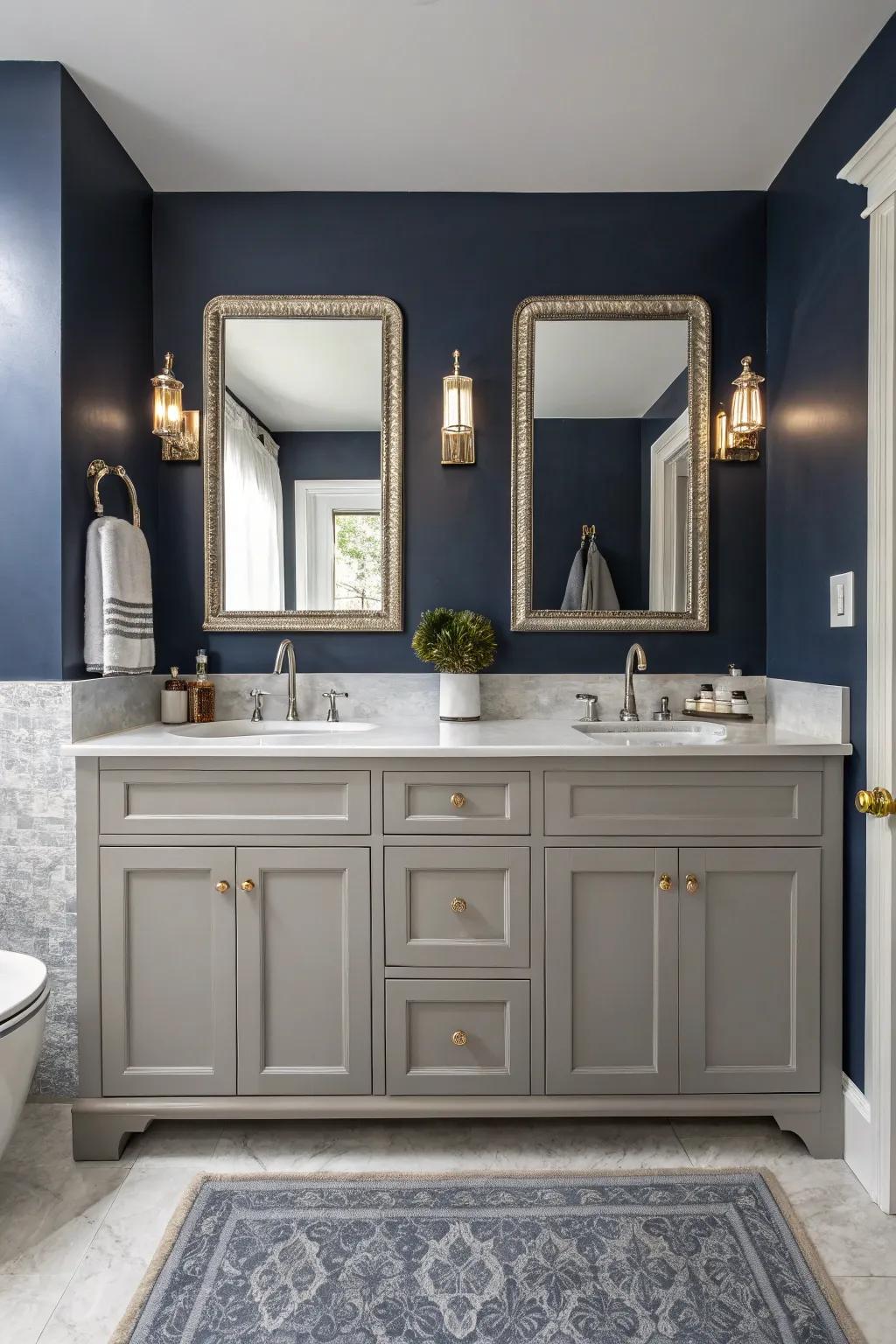 A bold bathroom design with a striking contrast between the gray vanity and navy wall.