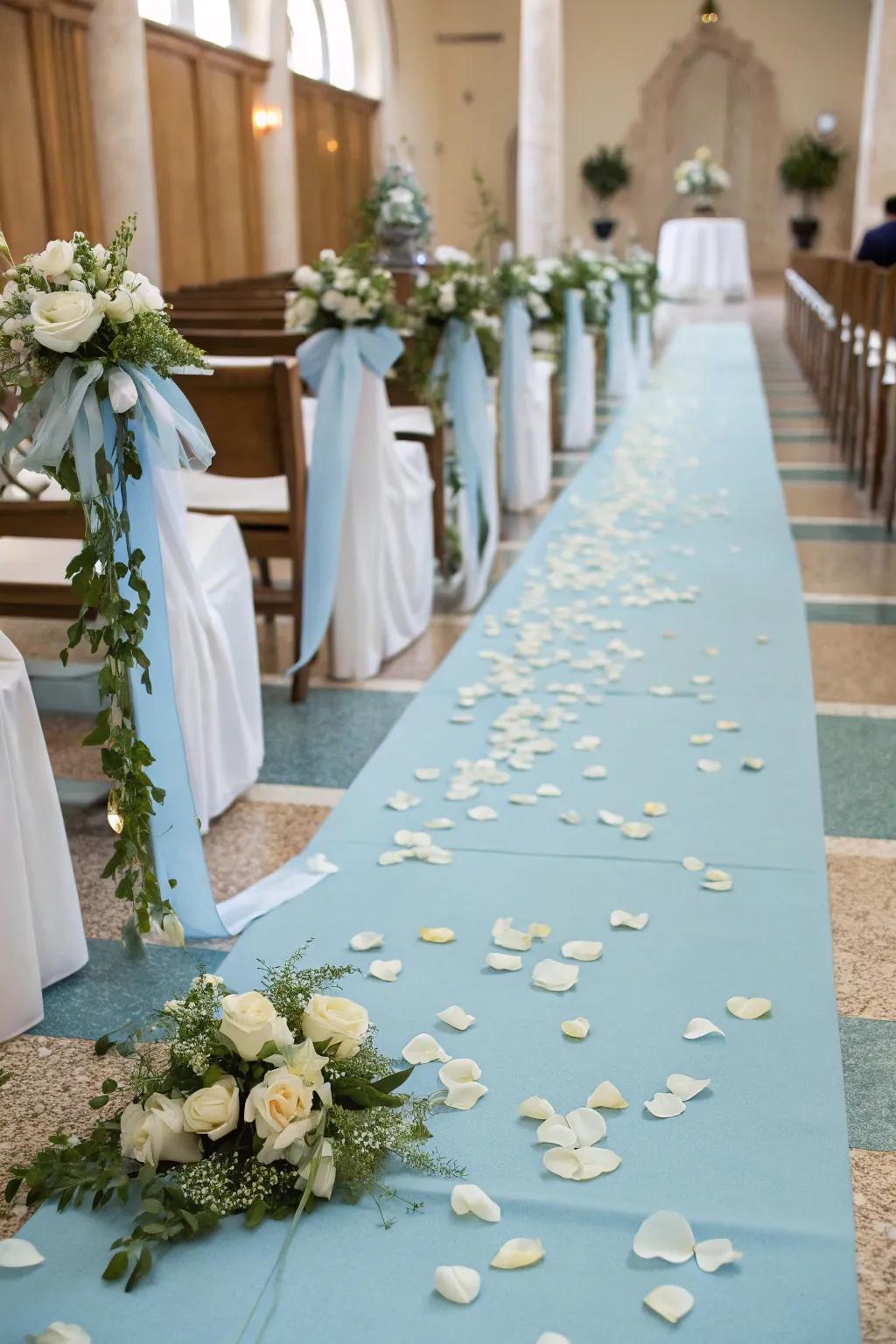 A baby blue aisle runner sets a romantic path for the ceremony.