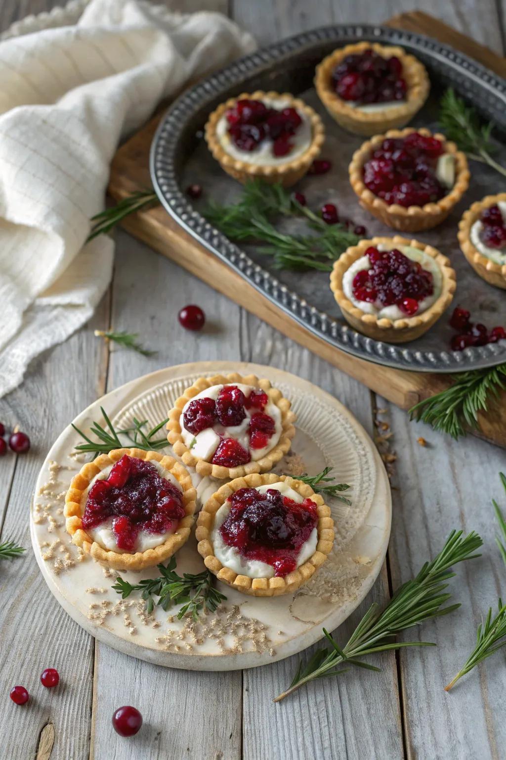 Tangy and sweet cranberry and goat cheese tartlets for a festive treat.